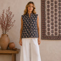 The Thari Hand-Printed Flower & Paisley Print Reversible Quilted Sleeveless Jacket