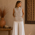 The Thari Hand-Printed Camel & Illusion Print Reversible Quilted Sleeveless Jacket