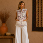 The Thari Hand-Printed Elephant & Flower Print Reversible Quilted Sleeveless Jacket