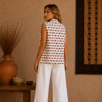 The Thari Hand-Printed Elephant & Flower Print Reversible Quilted Sleeveless Jacket